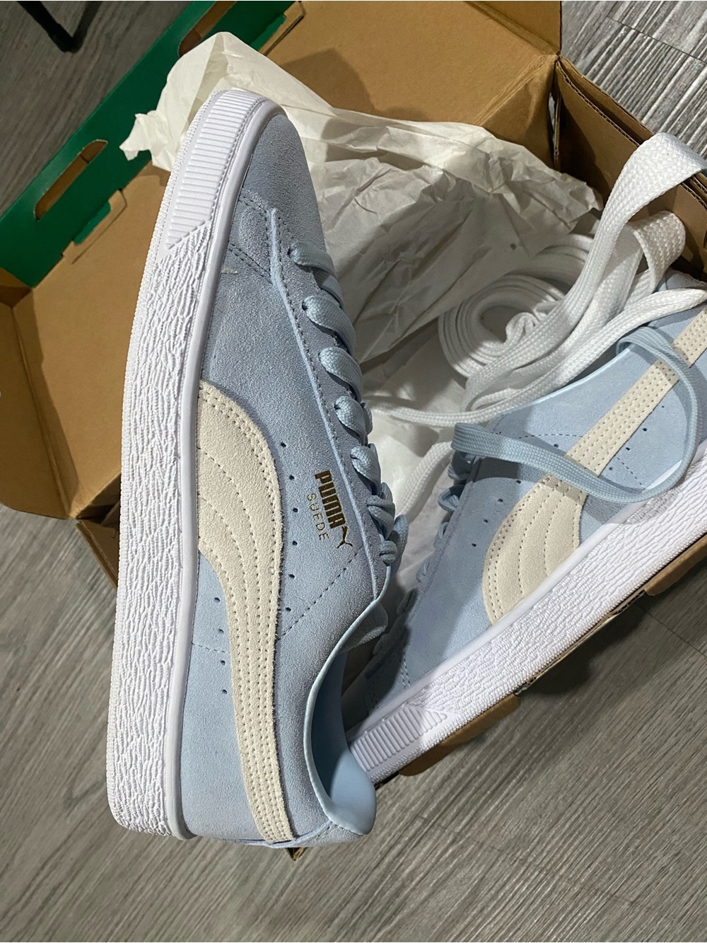 Puma Suede Low-Top Sneakers in Light Blue and Cream